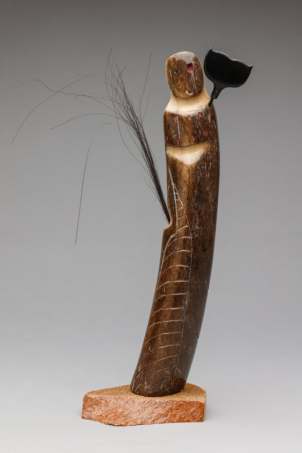 Shaman Transforming to Whale by Jerome Saclamana, Inupiaq