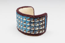 Bracelet depicting Cloud Design by Melanie Tallmadge Sainz, Ho-Chunk Nation