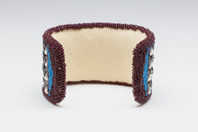 Bracelet depicting Cloud Design by Melanie Tallmadge Sainz, Ho-Chunk Nation