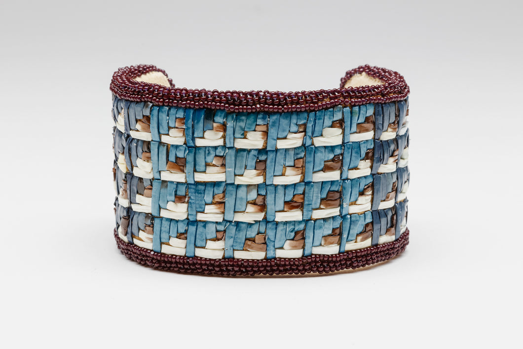 Bracelet depicting Cloud Design by Melanie Tallmadge Sainz, Ho-Chunk Nation