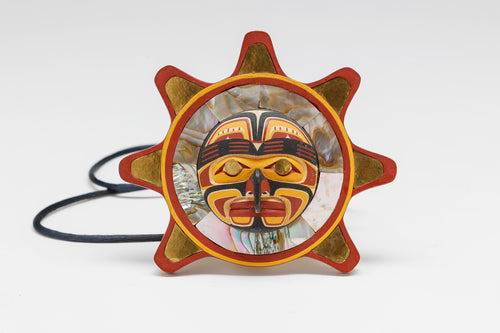 Namgis Sun Pendant by Kevin Cranmer, Kwakwaka’wakw