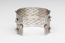 Hand Stamped Bracelet with Floral Design by Roland Brady, Navajo