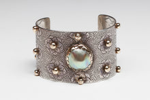 Hand Stamped Bracelet with Floral Design by Roland Brady, Navajo