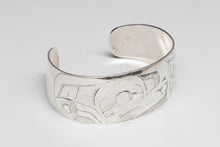 Bracelet depicting Raven and Human by Norman Tait, Nisga'a