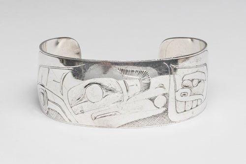 Bracelet depicting Raven and Human by Norman Tait, Nisga'a