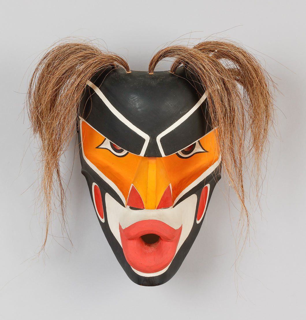 Mask depicting Dzunukwa by Gene Brabant, Cree
