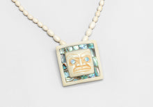 Pendant depicting Chilkat Face by Patty Fawn