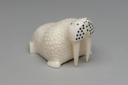 Carving depicting Textured Walrus by Warren Kakoona, Inupiaq