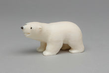 Carving depicting Polar Bear Cub by Ronnie Toolie, Yup'ik