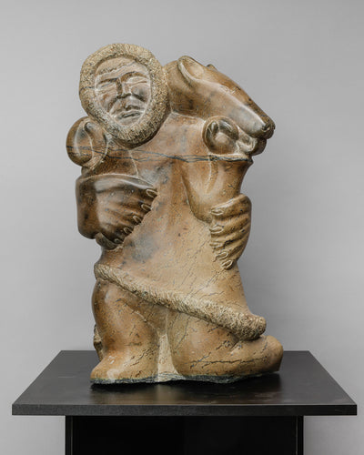 Man and Bear Soapstone Sculpture by Egesiak Simionie (1946-2007), Inuit