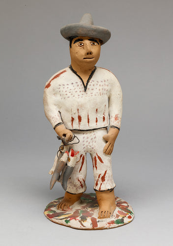 Figure of Man with Fish, Peru
