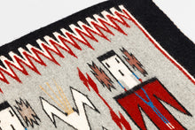 Navajo Yei Rug by Nellie Tso, Navajo
