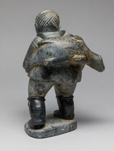 Vintage Hunter Carrying Seal, c. 1960, Inuit