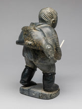 Vintage Hunter Carrying Seal, c. 1960, Inuit