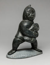 Man Carrying Child by Mathewsie Amidlak, Inuit