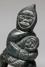 Man Carrying Child by Mathewsie Amidlak, Inuit