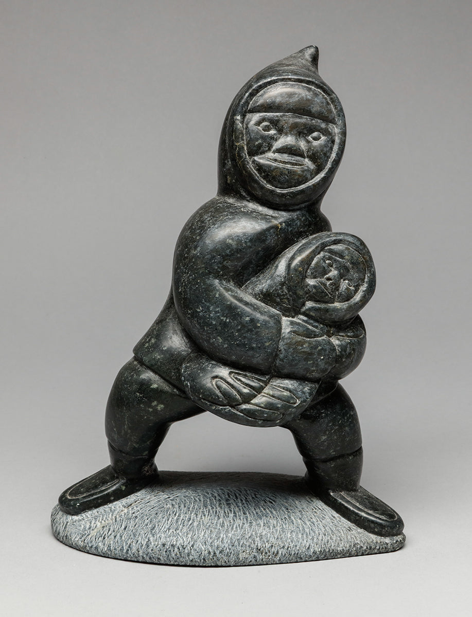 Man Carrying Child by Mathewsie Amidlak, Inuit