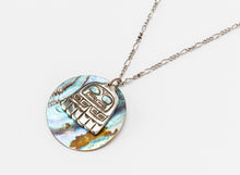Pendant depicting Eagle Tail by Patty Fawn