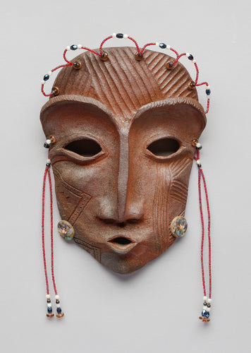 Mask depicting Inuit Girl by Lillian Pitt, Yakama