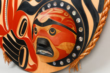 Panel depicting Wolf Moon by Moy Sutherland, Nuu-Chah-Nulth Nation