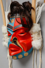 Mask depicting Kwakwaka’wakw Style Pookmis by Wayne Alfred