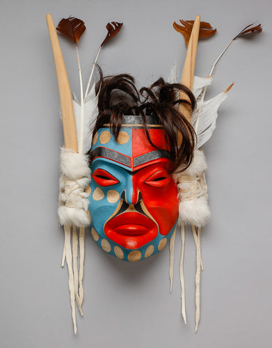 Mask depicting Kwakwaka’wakw Style Pookmis by Wayne Alfred