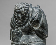 Giant Holding a Seal, c. 1970, Inuit Carving