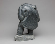 Giant Holding a Seal, c. 1970, Inuit Carving