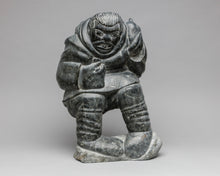 Giant Holding a Seal, c. 1970, Inuit Carving