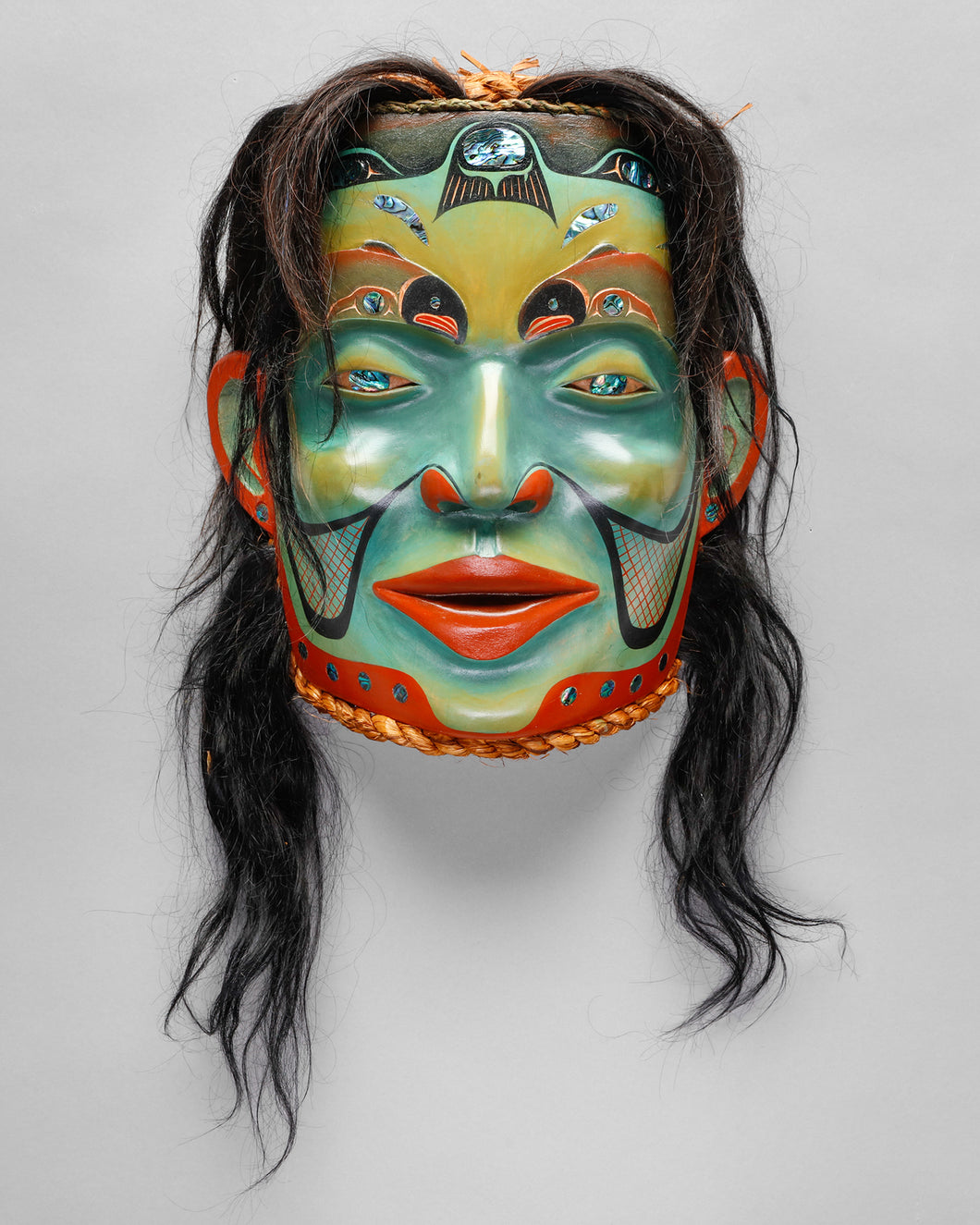 Mask depicting Salmon Woman by Janice Morin, Cree